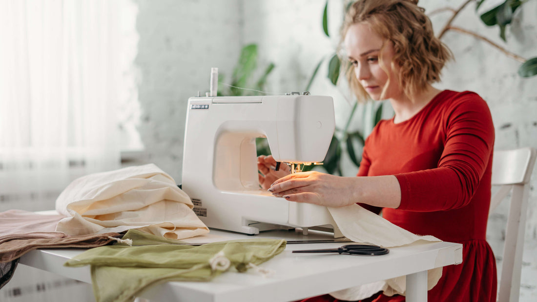 Girl working at sewing machine